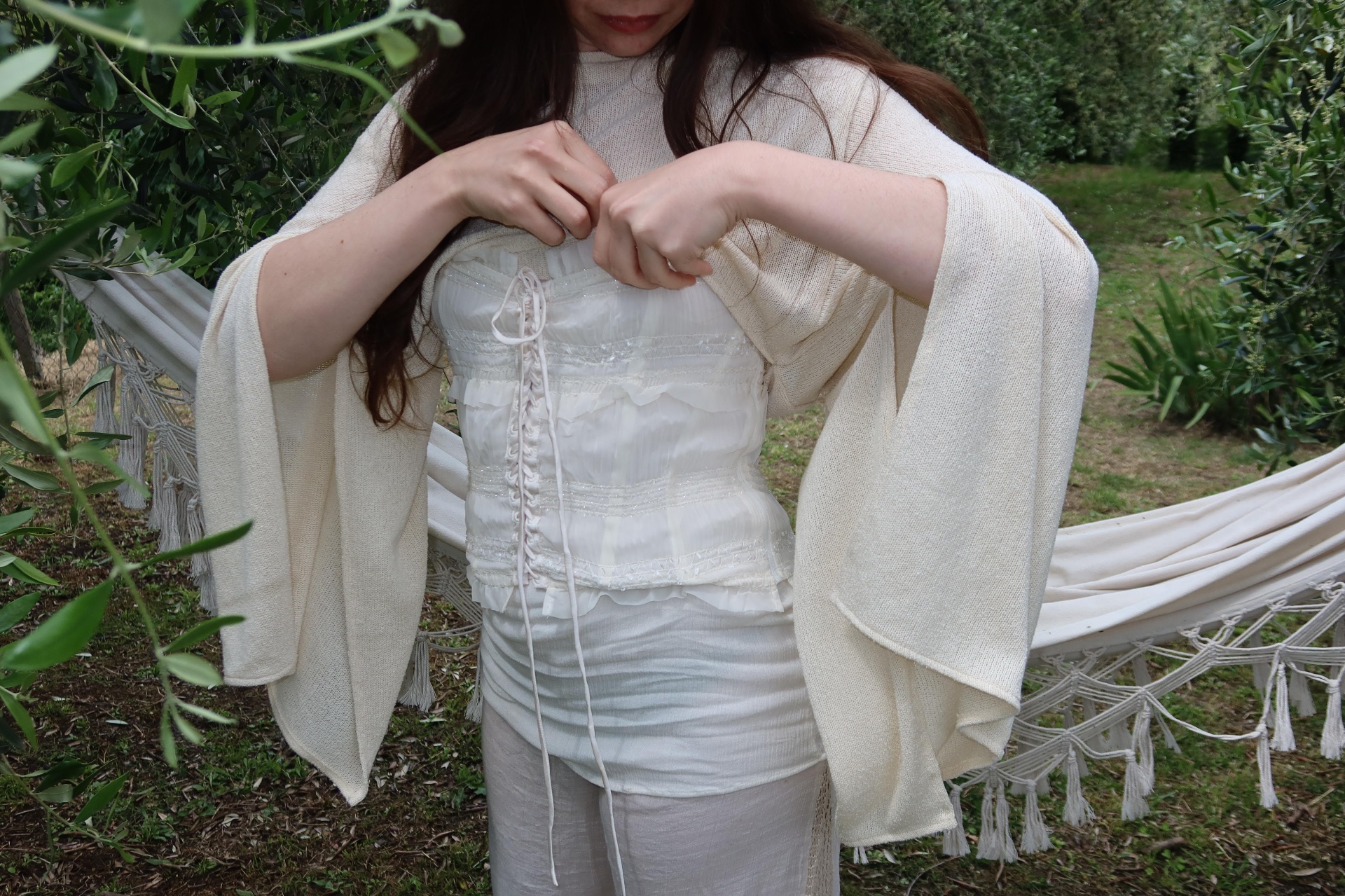 Garden of Eden — tying the corset by the hammock